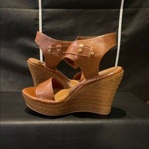 Very gently used Ugg leather wedge sandals. Very comfortable. Only worn twice.